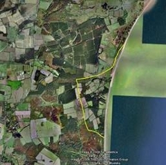 Dunwich located on the Suffolk Coast of England, in the southeast region of the North sea. Lower figure shows the existing parish boundary in yellow. (Maps derived from Google Earth) Zoomed out satelite map of UK showing location of Dunwich